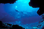 Scuba diver from cave on Astrolabe Reef, Fiji.